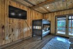 Rustic Sunsets - Lower Level King and Bunk Bedroom